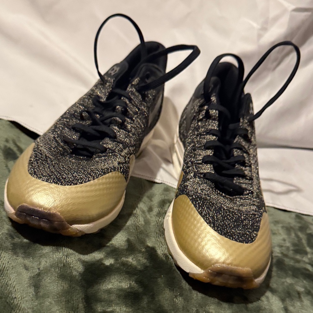 Nike Women's Sneakers Black and Gold